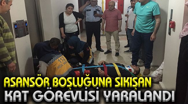 Asansör boşluğuna sıkışan kat görevlisi yaralandı