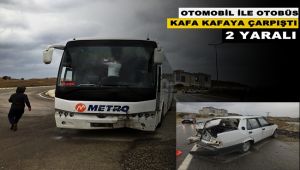 Otobüsle otomobil kafa kafaya çarpıştı; 2 yaralı