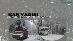 Kar yağışı ormanda çalışan sürücülere zor anlar yaşattı