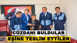 Zabıta ekipleri bulunan cüzdanı sahibinin eşine teslim etti