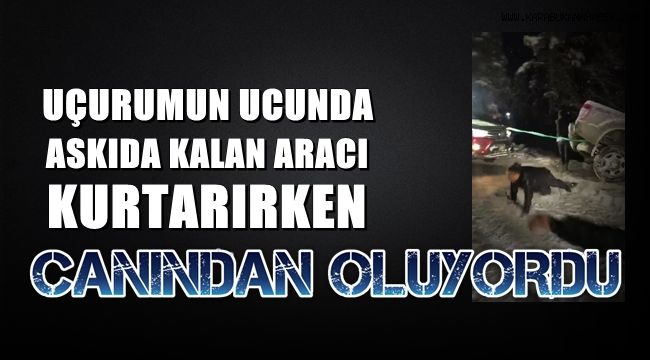 Uçurumun ucunda askıda kalan aracı kurtarırken canlarından oluyorlardı
