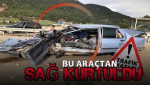 Hurda yığınına dönen otomobilden sağ kurtuldu