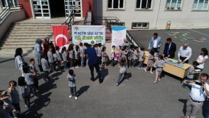 'Plastik şişeni getir, tatil kitabını götür' kampanyası