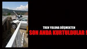 Tren yoluna düşmekten son anda kurtuldular