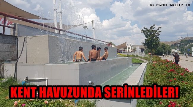 Kent havuzunda serinlediler