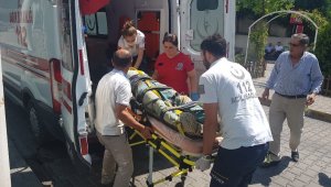 Kereste boşalttığı sırada dengesini kaybederek düşen işçi yaralandı