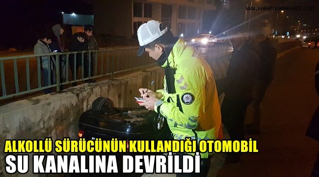 Alkollü sürücünün kullandığı otomobil su kanalına devrildi