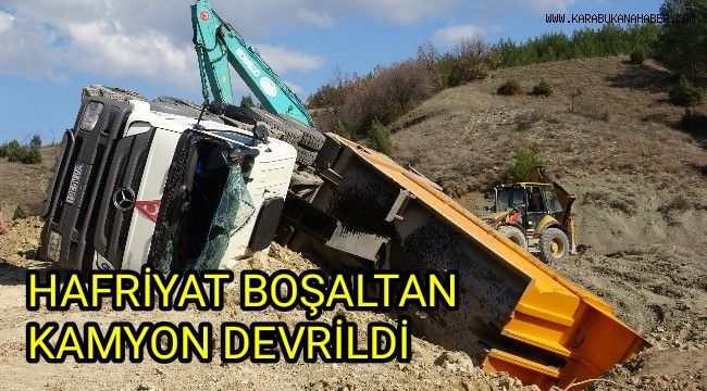 Hafriyat boşaltan kamyon devrildi: 1 yaralı