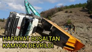 Hafriyat boşaltan kamyon devrildi: 1 yaralı