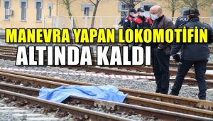 Manevra yapan lokomotifin altında kaldı