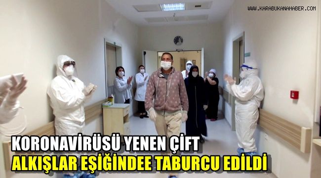 Korona virüsü yenen çift alkışlar eşliğinde taburcu edildi