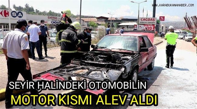 Seyir halindeki otomobilin motor kısmı alev aldı