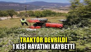Devrilen traktörün altında kalan sürücü öldü, oğlu son anda kurtuldu