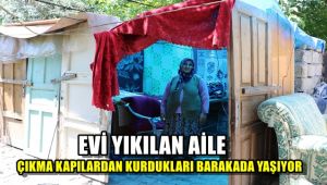 Evi yıkılan aile çıkma kapılardan kurdukları barakada yaşıyor