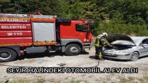 Seyir halindeki otomobil alev aldı