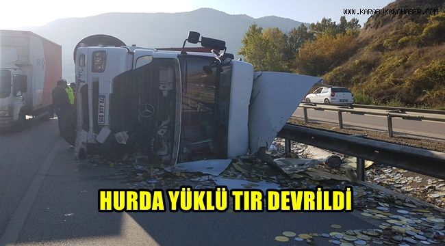 Hurda yüklü tır devrildi: 1 yaralı
