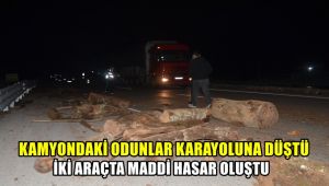 Kamyondaki odunlar karayoluna düştü, iki araçta maddi hasar oluştu
