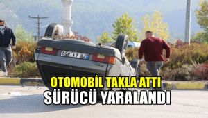 Takla atan otomobil sürücüsü yaralandı