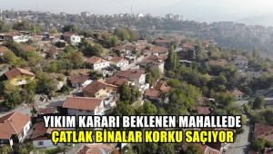 Yıkım kararı beklenen mahallede çatlak binalar korku saçıyor