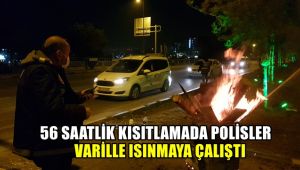 56 saatlik kısıtlamada Polisler varillerle ısınmaya çalıştı