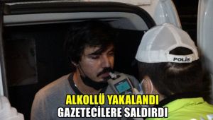 Alkollü yakalandı gazetecilere saldırdı