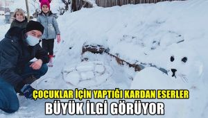 Çocukları için kardan yaptığı eserler büyük ilgi görüyor