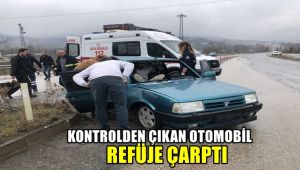 Kontrolden çıkan otomobil refüje çarptı: 2 yaralı