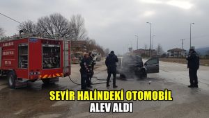 Seyir halindeki otomobil alev aldı