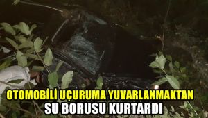 Otomobili uçuruma yuvarlanmaktan su borusu kurtardı: 3 yaralı