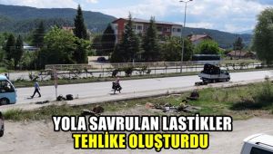 Yola savrulan lastikler tehlike oluşturdu
