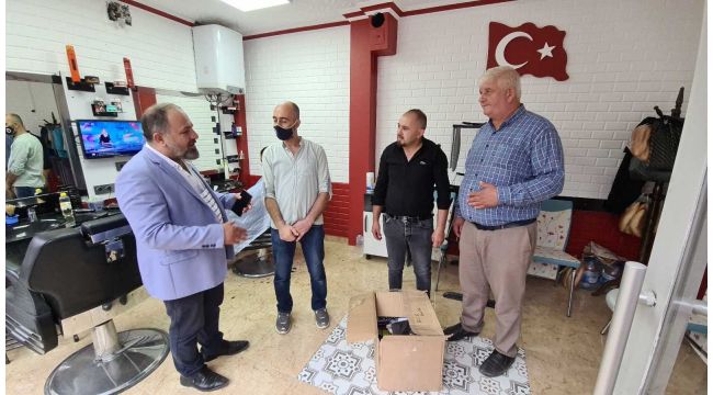 Selde mağdur olan berber esnafına malzeme yardımı