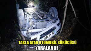 Takla atan otomobil sürücüsü yaralandı