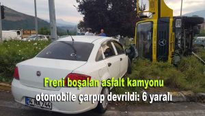 Freni boşalan asfalt kamyonu otomobile çarpıp devrildi: 6 yaralı