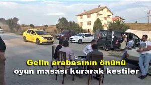 Gelin arabasının önünü oyun masası kurarak kestiler