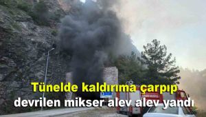 Tünelde kaldırıma çarpıp devrilen mikser alev alev yandı