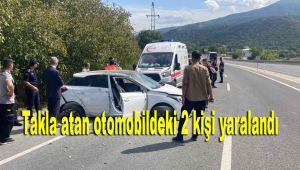 Takla atan otomobildeki 2 kişi yaralandı