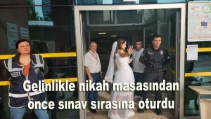 Gelinlikle nikah masasından önce sınav sırasına oturdu