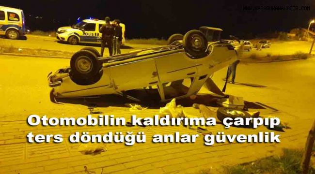 Otomobilin kaldırıma çarpıp ters döndüğü anlar güvenlik kamerasına yansıdı