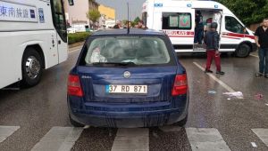 Otomobille çarpışan motosiklet sürücüsü yaralandı