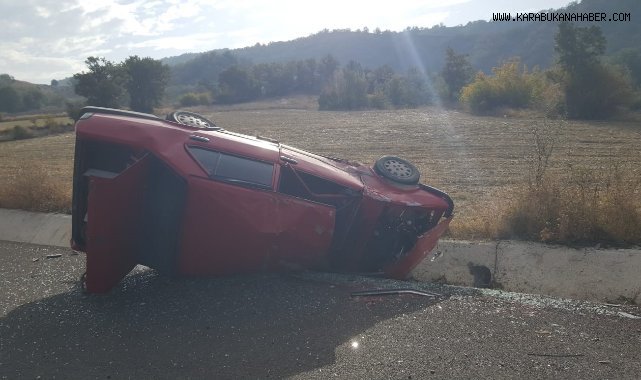Takla atan otomobilde iki kişi yaralandı