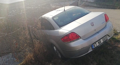 Otomobil istinat duvarında asılı kaldı: 1 yaralı