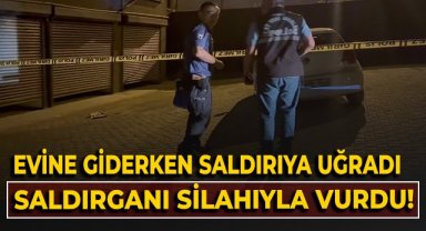 Evine giderken saldırıya uğradı saldırganı silahıyla vurdu