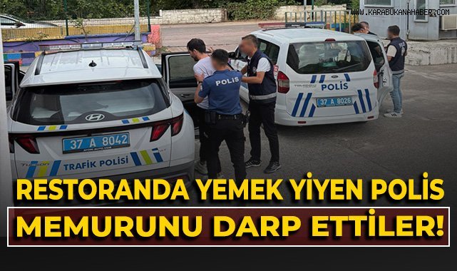 Restoranda yemek yiyen polis memurunu darp ettiler