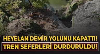 Heyelan demir yolunu kapattı, tren seferleri durduruldu