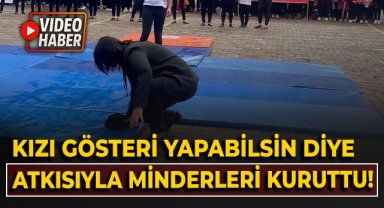 Kızı gösteri yapabilsin diye atkısıyla minderleri kuruttu