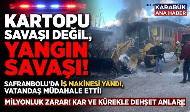 İş makinesinde çıkan yangını karla söndürmeye çalıştılar