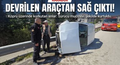Köprüde kontrolden çıkan otomobil yan devrildi: Sürücü yara almadan kurtuldu